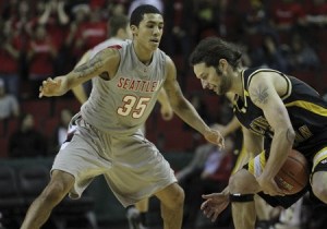 Seattle University redshirt freshman guard Jarell Flora (left) defends during the team’s Oct. 31 exhibition game against Pacific Lutheran University at KeyArena in Seattle. Flora was a standout guard for the Bremerton High School Knights last season.