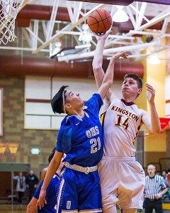 Kingston High School’s Andrew Shaw (14) led the Buccaneer offense against the Olympic Trojans Friday night
