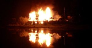 Fire engulfed a two-story house on Virginia Cove early Monday morning.