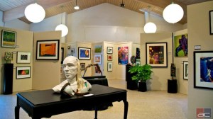 Works of art line the display area for a previous art competition at the Kitsap Arts & Crafts Festival.