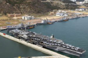 The USS John C. Stennis (CVN 74) (foreground)