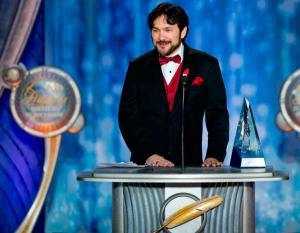 Randy Henderson accepts the Golden Pen Award at the Writers of the Future awards ceremony in Los Angeles on April 13.