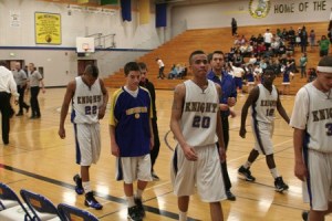 The Bremerton High School boys basketball team heads to the locker room after taking a 33-20 lead against North Kitsap High School. The Knights started the season with two straight victories under new head coach Darren Bowden.