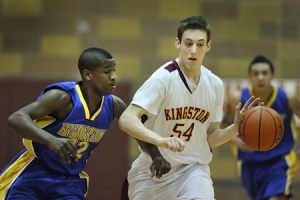 Kingston's Ryan Byers dribbles up court against Bremerton's Michael Lawrence Tuesday at the Kingston High gym.