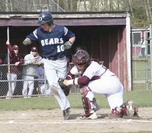 SK catcher Alex Sablan is late on the tag to Olympia’s Tanner Fijolek