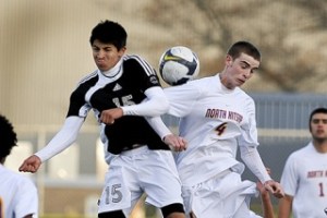 North Kitsap's Patrick Prevost challenges Klahowya's Marc Barbosa on a header Tuesday during a 7-0 Viking win at the NK Stadium. North clinched the Olympic League Class 3A title with the victory.