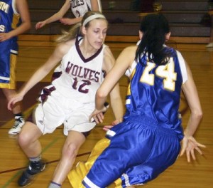 South Kitsap junior guard Carly Bakalarski puts defensive pressure on Stadium’s Stephanie Bowen during the Wolves’ 46-18 win on Wednesday.