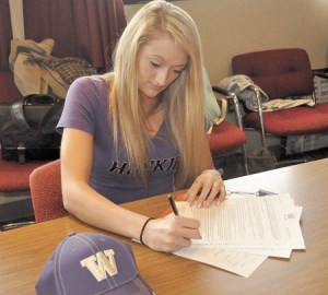 South Kitsap senior Becca Schoales signed to play soccer Wednesday at the University of Washington.