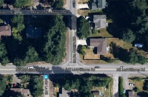 The intersection of NE McWilliams Road and Old Military Road.