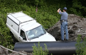 A pickup plunged over an embankment off State Route 104 in Port Gamble Tuesday evening.