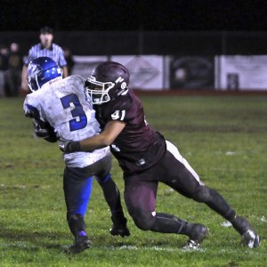 South Kitsap senior linebacker Mikey Garcia is part of a defense that expects dramatic improvement after surrendering at least 40 points in four games last year.