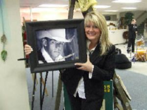 Event organizer Cynthia Engelgau displays one of the many pieces of art which will be shown at the West Sound Art Council's annual spring tea and fashion show on May 10. Event organizer Cynthia Engelgau displays one of the many pieces of art which will be shown at the West Sound Art Council's annual spring tea and fashion show on May 10.