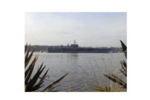 USS Kitty Hawk’s bow is shown as the ship pulls into Sinclair Inlet near Puget Sound Naval Shipyard in Bremerton Sept. 2. Bremerton is the ship’s new homeport and it will be its last