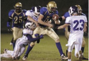 Jacob Belden (5) fumbles the ball against North Thurston at the BHS Homecoming game Oct. 10. Belden completed 12 of 20 passes for 119 yards