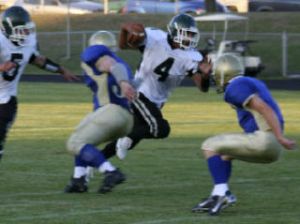 Klahowya speedster Andre Moore makes Bremerton’s defenders try to cut back after he turned up field last Friday in the Knights’ 16-10 win.