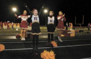 Junior cheer squad and youngest member Delaney Olsen