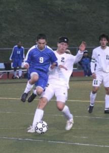 Klahowya’s Tucker Moran collides with a jumping Robert Martinez of Washington (Tacoma) in Friday’s 2-1 Eagles win.