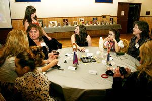 Paper dolls adorned the tables for each of the 13 little Sisters at the ninth annual Miss Poulsbo/Miss Kitsap Little Sister Tea Party.