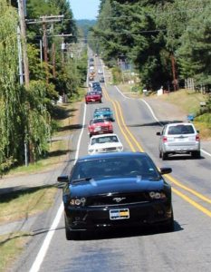 A herd of Mustangs heads to the Mustangs on the Waterfront event in Port Orchard. The Mustang