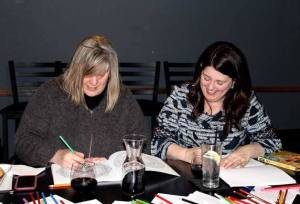 Christine Davis and Molly Young color at the Cava