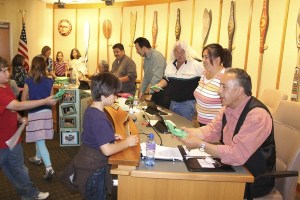 Suquamish Elementary School students present Tribal Council members with gifts