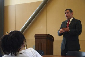 Judson Miller addresses residents at a public meeting May 23. He has been selected as North Kitsap High School’s new principal.