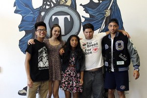 Olympic High School valedictorians and salutatorians pose together.
