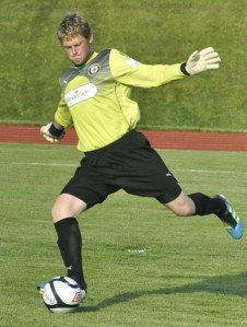 Bryan Meredith clears the ball during the Kitsap Pumas' 3-1 victory against Real Colorado Tuesday.