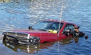 Corporal Polonsky volunteered his specialized skills and personal scuba gear to help “hook the Ram” and get a truck out of the water after it floated out into Kitsap Lake.