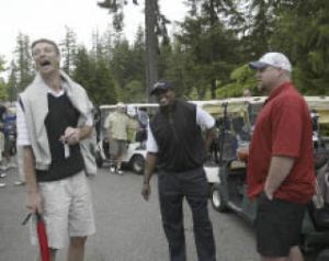Former Sonic Detlef Schrempf (left) shares a laugh with NFLers Lawyer Milloy (center) and Benji Olson Monday.