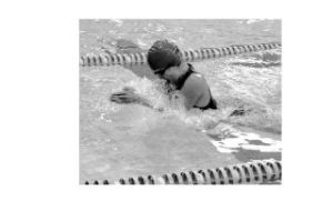 Standout freshman Viking swimmer Bethany Aban gracefully parts the waters in the 200-individual medley breast stroke. Aban broke her own school record in the 100-yard breast stroke in 1:13:03. The Vikes defeated Bremerton 111-95.