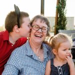 Karen Fletcher, middle, chose a trip to Disneyland with her family as her Dream Foundation dream. It was the first time her grandchildren, ages 9 and 2, visited the &ldquo;Happiest Place on Earth.&rdquo; Kelly Sweda Photography / Dream Foundation