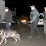 Grays Harbor Sheriff&rsquo;s Deputy Tracy Gay leads his K-9 partner, Max, back to the car after completing a training hunt for a decoy Nov. 15 at Kitsap Fairgrounds. K-9 dogs and handlers train extensively in obedience, protection and scent work before being allowed to work out in the field, and must recertify with the Washington State Police Canine Assocation every year.                                Michelle Beahm / Kitsap News Group