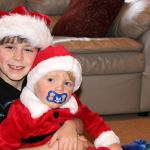 Zachary Darner, left, and Noah Darner are brothers. Last year, Noah had a health scare that resulted in three trips to the emergency room, which their mother Beth Friendman Darner described as &ldquo;really traumatic&rdquo; for Zachary, who&rsquo;d always wanted a little brother. Those trips inspired Zachary and his friend, Ryan Downey, to collect toys, stuffed animals and books for hospitalized children to bring a little joy to their holidays.                                Michelle Beahm / Kitsap News Group