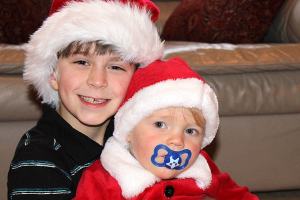 Zachary Darner, left, and Noah Darner are brothers. Last year, Noah had a health scare that resulted in three trips to the emergency room, which their mother Beth Friendman Darner described as &ldquo;really traumatic&rdquo; for Zachary, who&rsquo;d always wanted a little brother. Those trips inspired Zachary and his friend, Ryan Downey, to collect toys, stuffed animals and books for hospitalized children to bring a little joy to their holidays.                                Michelle Beahm / Kitsap News Group