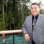 Port Gamble S&rsquo;Klallam Chairman Jeromy Sullivan pauses on the balcony of a suite in The Point Hotel. The hotel &ldquo;is a long time coming,&rdquo; he said. Richard Walker / Kitsap News Group
