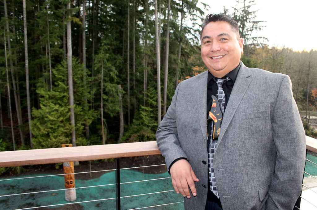 Port Gamble S&rsquo;Klallam Chairman Jeromy Sullivan pauses on the balcony of a suite in The Point Hotel. The hotel &ldquo;is a long time coming,&rdquo; he said. Richard Walker / Kitsap News Group