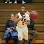 SK basketball loses home opener to Curtis