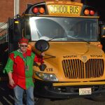 Santa Claus is coming to town – in a school bus