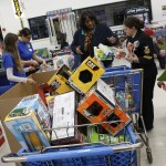 Checking out at Toys R Us. Toys R Us employees set back popular toys when they are on sale so that the Marines get &ldquo;the good stuff&rdquo; and at a great, discounted price. Mark Briant/Kitsap Daily News