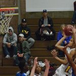 SK basketball loses home opener to Curtis