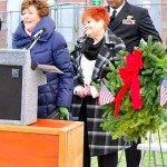 Bremerton Mayor Patty Lent explains the origins of Wreaths Across America in front of the Tomb of the Unknown Soldier at Ivy Green Cemetery in Bremerton, during the Dec. 17 Wreaths Across America ceremony. (U.S. Navy photo)