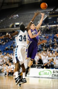 North Kitsap's Kyle Erickson rebounds a ball in the second quarter of playoff action at the Tacoma Dome Wednesday.