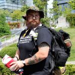 Sean Delaire, founder of Left Right Straight, gets ready to head out on a ruck march to raise awareness of the high rate of veteran suicide in July. Recently, Left Right Straight hosted a Buddy Check event, reminding people to reach out to their veteran and active-duty friends to check in and make sure they&rsquo;re alright. Michelle Beahm / Kitsap News Group