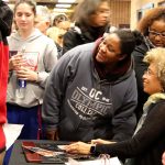 After her lecture on educational equity, Angela Davis signed books and had her photo taken with audience members. Michelle Beahm / Kitsap News Group