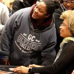 After her lecture on educational equity, Angela Davis signed books and had her photo taken with audience members. Michelle Beahm / Kitsap News Group