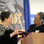 Rev. Freda Cash, right, gives keynote speaker Rosalund Jenkins with a plaque during the 23rd annual Martin Luther King Jr. Celebration on Jan. 16. Michelle Beahm / Kitsap News Group