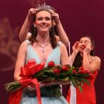 Miss Kitsap MacKenzie Zurbrugg receives her title crown from her predecessor, Amy Liu.  Olympic Photo Group