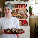 Elizabeth Wing presents hand-dipped strawberries at Amy&rsquo;s Decadent Chocolate, one of their most popular Valentine&rsquo;s Day items. Michelle Beahm / Kitsap News Group
