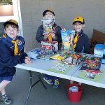 Wolves Dresden Hull, Tristan Crittenden and Evan Shipman of Den 1, Pack 5239 chartered to VFW Post 239, sell popcorn to raise funds for their pack and Chief Seattle Council in front of Lowe&rsquo;s Home Improvement Center in Port Orchard on Sept. 27, 2015. Photo courtesy Keith Cianico